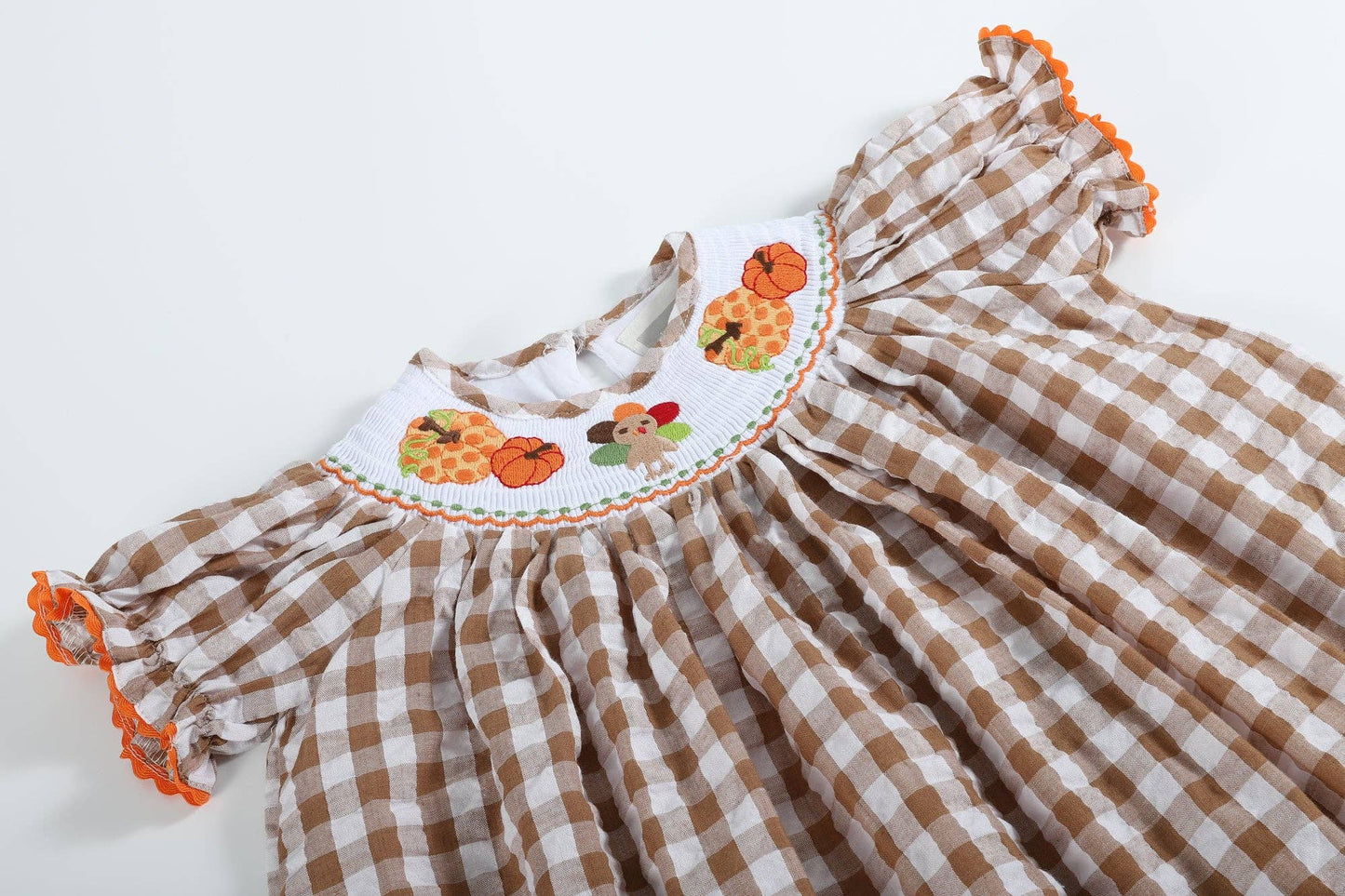 Tessa Turkey Smocked Dress