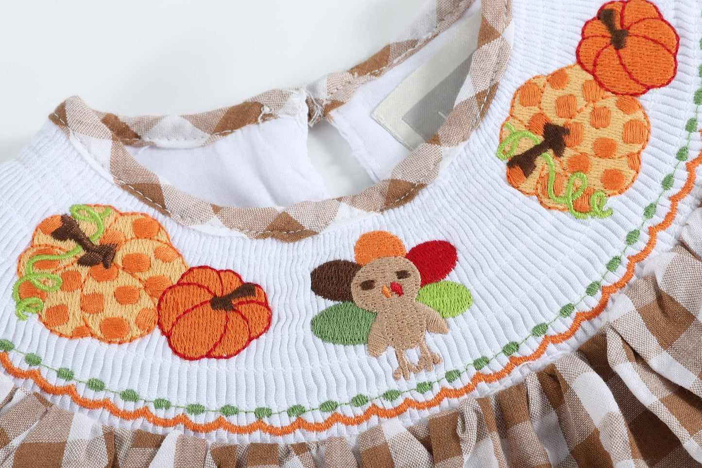 Tessa Turkey Smocked Dress